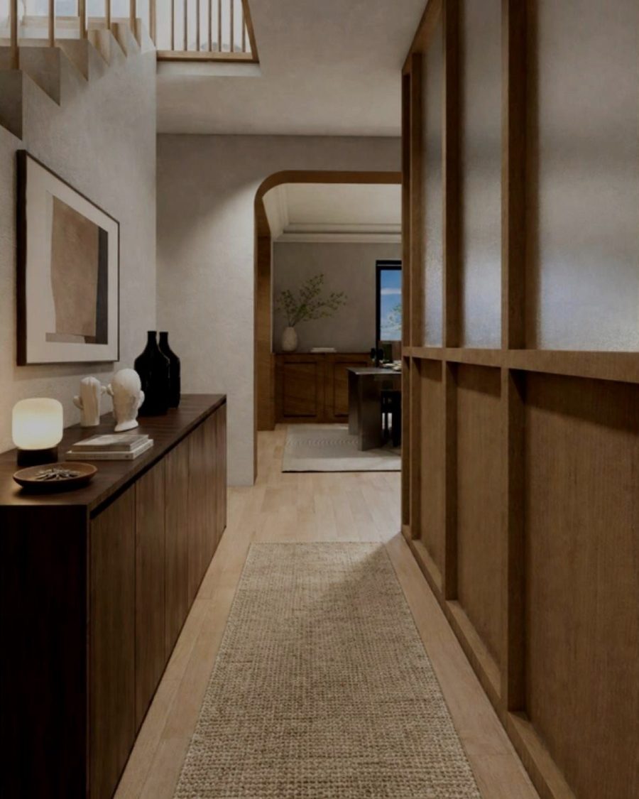 The entrance hall at Maison Morangis: a walnut sideboard, oak screen and jute runner leading through to the dining room